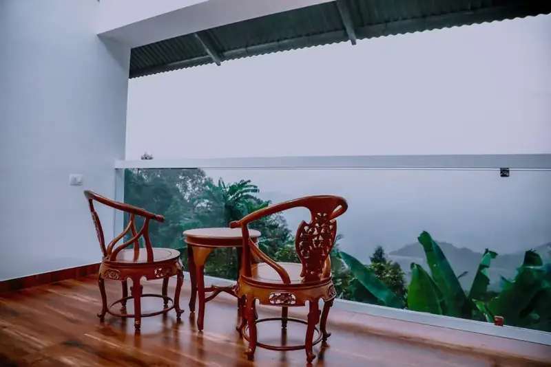 Sit-out chairs facing the mountains in La Vista Villa